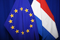Vlaggen EU en Nederland